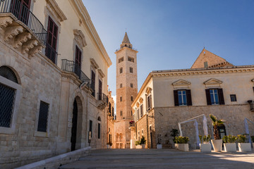 Italy, Apulia, Province of Barletta-Andria-Trani, Trani. View down a street to San Nicola Pellegrino cathedral