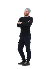 in full growth. smiling bearded man looking at copy space