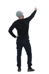 rear view. confident athletic man pointing to blank screen