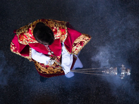 Purifying the souls, Child moving the censer