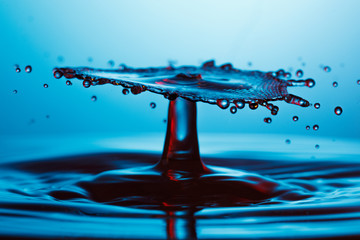 drop of water falling down in the water 