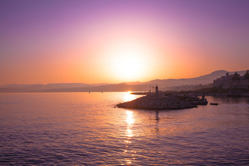 Fototapeta na wymiar Sunset. Sunset at the port of Estepona. Costa del Sol, Andalusia, Malaga.