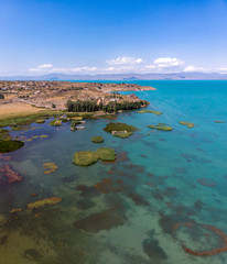 Hayravank monastery on the shores of the blue lake Sevan in Armenia. Aerial view panoramic