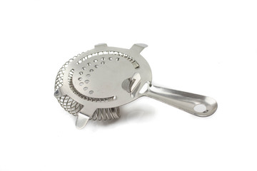 A macro, close up image of a stainless steel cocktail strainer isolated against a clean, white background