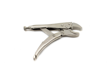 A close up, macro image of a pair of steel vice grips shot isolated on a clean, white background