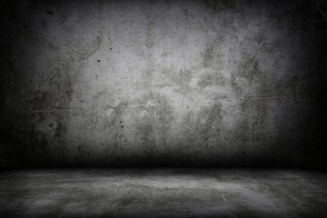 Grunge interior room with concrete wall and floor. Empty concrete space.