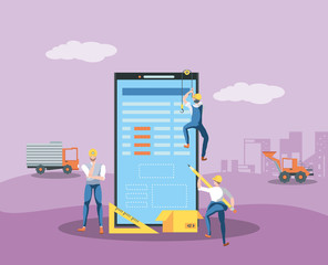 builders and smartphone with webpage under cosntruction