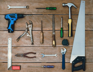 old instruments constructor or renovation for build and repair house on wooden background