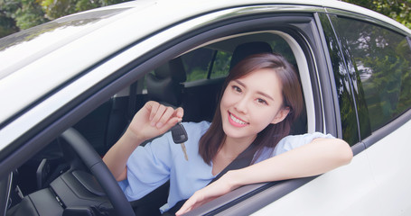 Fototapeta na wymiar Asian woman hold car key