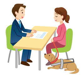 相談する視覚障害者