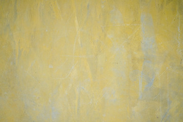 Yellow concrete wall texture background