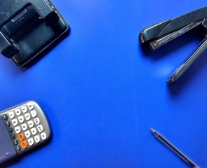 Stapler, calculator, pen office equipment. Office work © ByronObed