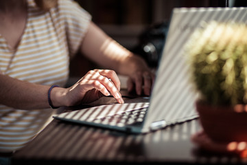Fototapeta premium woman working in a home office - social media influence, blogger, vlogger, freedom