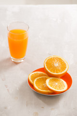 Be cut to remove the orange juice to drink and eat and be healthy.