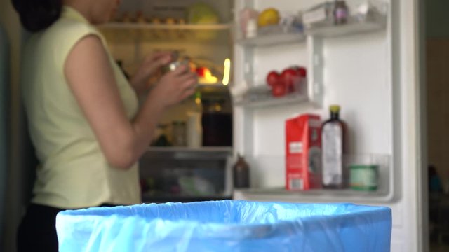 Throwing food waste in the trash bin. Food Loss and wastage reduction. Food waste disposed of by household. Leftovers from a meal, expired or stale food