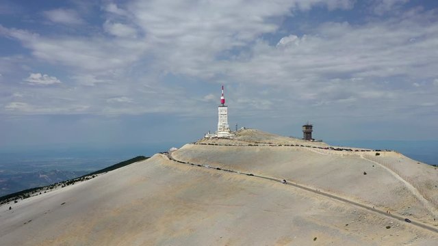 The famous mountain Mont Ventoux in France during a partly cloudy summer day, aerial shot.
