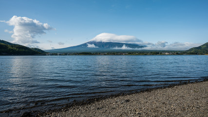 The lake and the sky have Mount Fuji in the background.