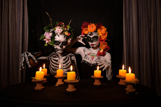 Halloween, Day of the Dead portrait body paint decorated with flowers, Horror concept.