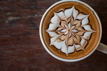 Cup of coffee with  latte art on top