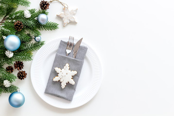 Christmas table setting with fir tree and toys on white background top view space for text