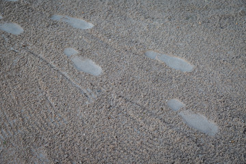Footprint on sand beach