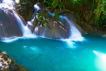 Erawan Waterfall with green water in natural