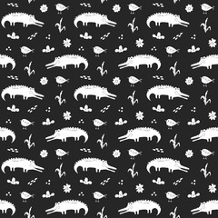 Naklejka premium Cute Crocodile or Alligator with little bird Seamless Pattern, Cartoon Hand Drawn Animal Doodles Vector Illustration background