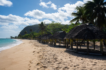 Beach fale's on a white sand beach on Lalomanu, Samoa