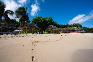 Beach fale's on a white sand beach on Lalomanu, Samoa