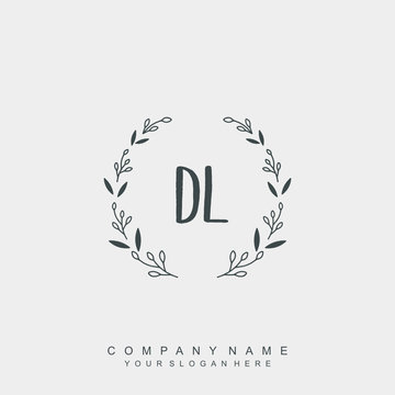 letter DL surrounded by beautiful and elegant flowers and leaves. Wedding monogram logo template.