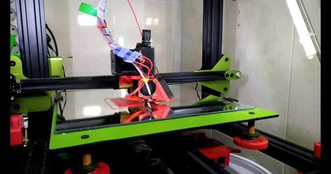 time lapse green and black 3d printer printing pla