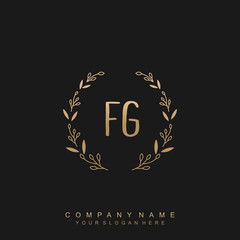 letter FG surrounded by beautiful and elegant flowers and leaves. Wedding monogram logo template.