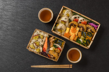 Fototapeta na wymiar 典型的な和食(弁当) Japanese style famous lunch box (bento)