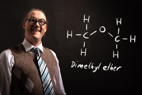 Professor presenting handdrawn chemical formula of Dimethyl ether methoxymethane DME