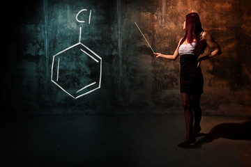 Sexy girl or secretary or female student presenting handdrawn chemical formula of Chlorobenzene