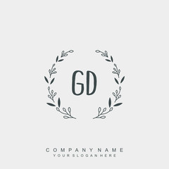 letter GD surrounded by beautiful and elegant flowers and leaves. Wedding monogram logo template.