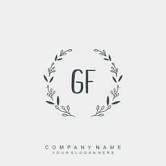 letter GF surrounded by beautiful and elegant flowers and leaves. Wedding monogram logo template.