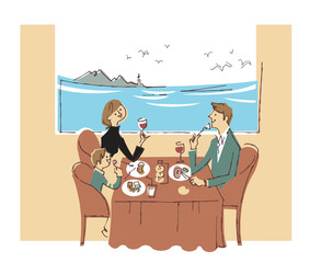 海を見ながら食事する家族