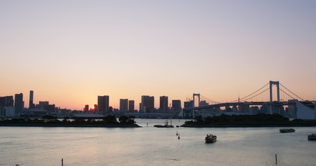 Odaiba city landscape at sunset