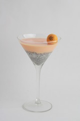 glass with chia and medlars pudding