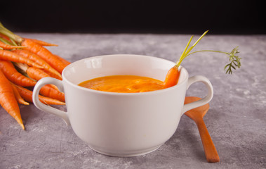 Healthy eating carrot cream soup. Vegetarian vegetables soup.