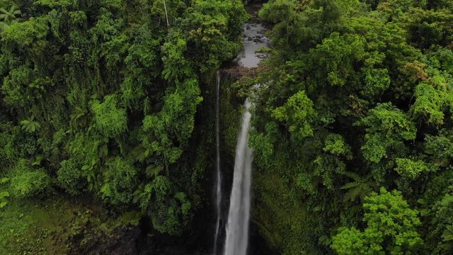 Aerial shot approaching Fuipisia Waterfall in Western Samoa