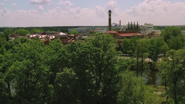 View from a drone of a small town and its old paper factory