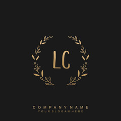 letter LC surrounded by beautiful and elegant flowers and leaves. Wedding monogram logo template.