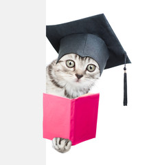 Graduated cat with open book peeking  behind empty white banner. isolated on white background