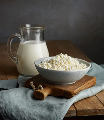milk jug and bowl of cottage cheese