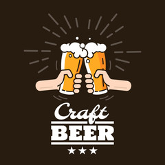 Two hands clink glasses with beer. Beer background concept for banners, posters, flyers and promotional material. People in the pub clink mugs of beer. Friends having fun at the party