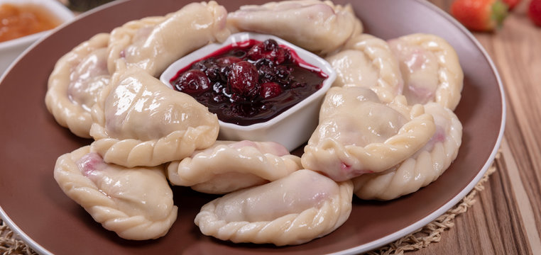 Dumplings with berry jam. A national dish of Russian and Ukrainian cuisine
