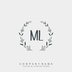 letter ML surrounded by beautiful and elegant flowers and leaves. Wedding monogram logo template.