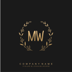 letter MW surrounded by beautiful and elegant flowers and leaves. Wedding monogram logo template.